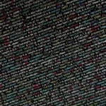 Kode pemrograman berwarna-warni di layar komputer yang menggambarkan algoritma dan logika pemrograman